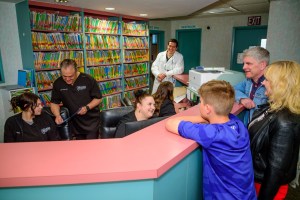 staff working with family and dentists